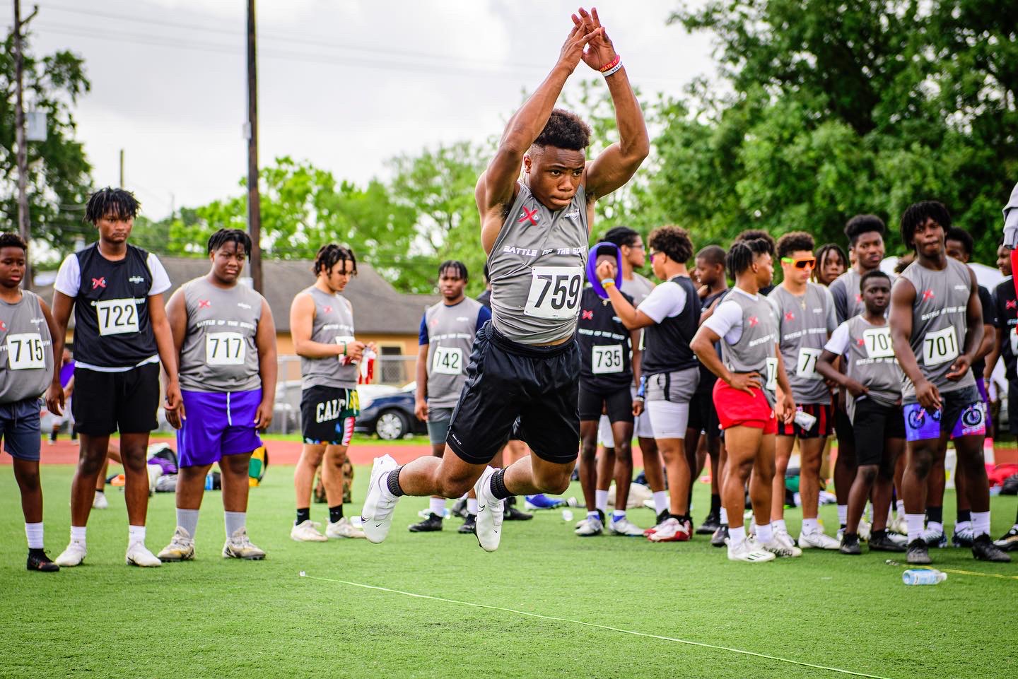 Athletes and coaches celebrating at an event